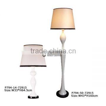 white modern standing lamp with acrylic base