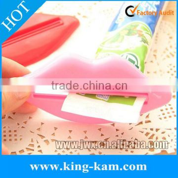 Fashionable pink lip squeezer for bathroom decoration