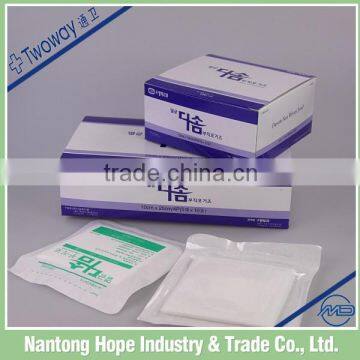 surgical ressing nonwoven pads