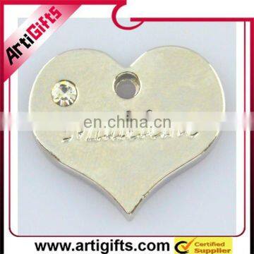 Metal heart shaped name pendant