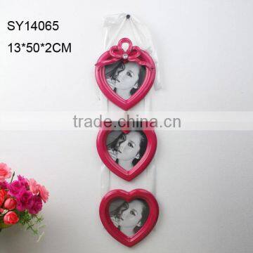 Multi picture photo frame heart shaped.