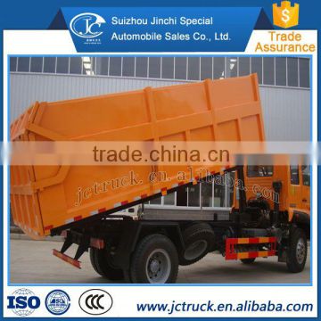 The popular dump howo sino 4x2 butt seam compression garbage truck The wholesale price