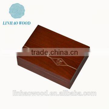 simple wooden gift box with an artistic design