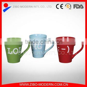 cone funnel shape coloured glaze ceramic mug with decal design