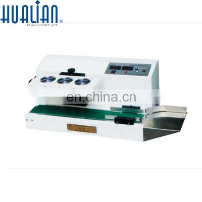 LGYF-1500A-I Hualian Packing Table-Style Induction Continuous Bottle Capping Sealing Machine Cap Sealer