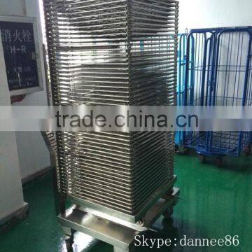 Stainless steel industrial drying rack into hot oven