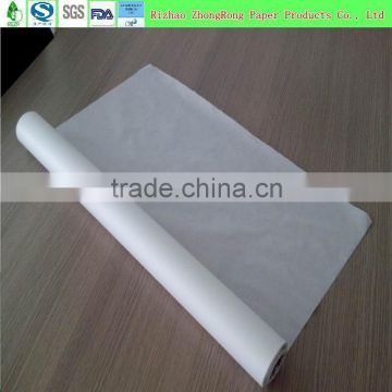 pe coated tissue paper on medical bed or table