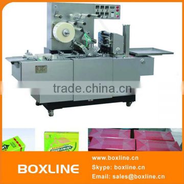 Automatic box heat shrinkage wrapping machine