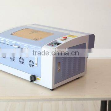 Portable Mobile Phone Laser Engraving Machine Suppliers Offer Best Price for Tiles,Glass,Cups,Iphone Case,Crafts