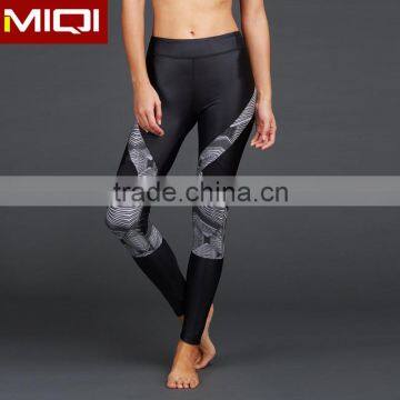 Wholesale womens yoga fitness wear sexy leg design yoga leggings for ladies