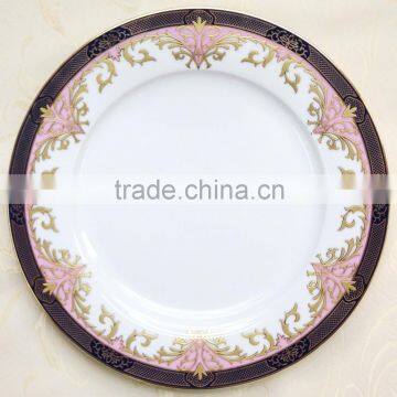 Porcelain dinner plate with light colored design