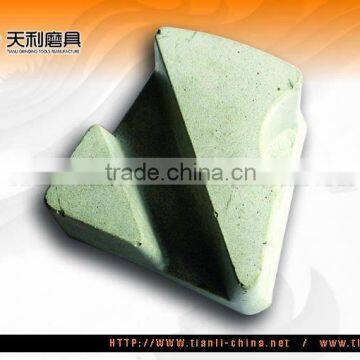 Magnesite-bonded abrasive block for marble