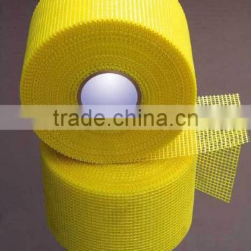 Adhesive resistant fiberglass mesh tape