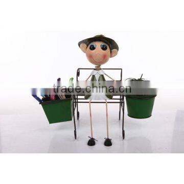 BOY ON SOFA WITH POT & PENCIL BOX