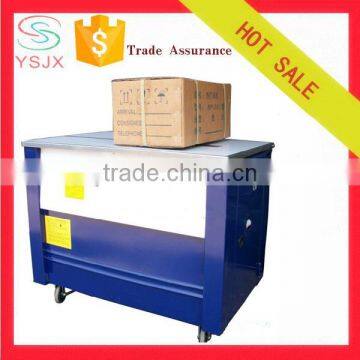 Table type semi automatic electric carton box tying machine