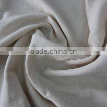 organic cotton muslin blanket in light brown color