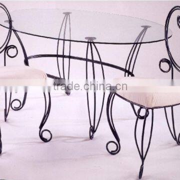 wrought iron dining chairs and table