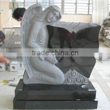 Black granite hand carved angel with butterfly tombstone