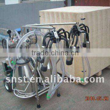 Double barrel milking machine