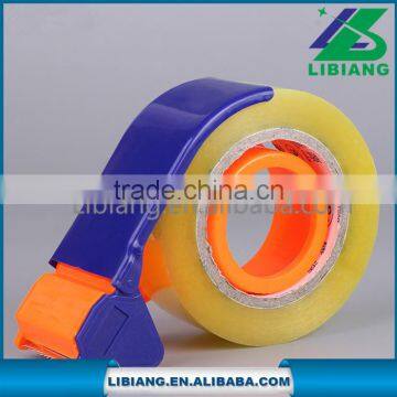 Plastic adhesive tape dispenser