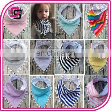 Trendy soft baby bib wholesale price hot selling cotton baby bandana bib with tassels