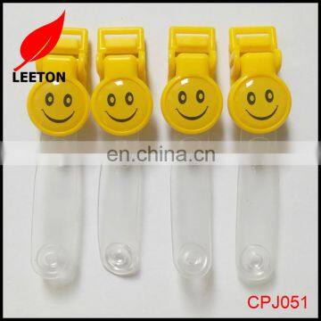 Factory custom logo smile face plastic ID badge clip