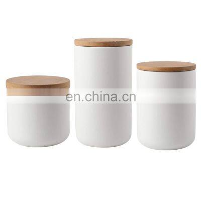 New Custom Certificated White Black Cylinder Unique Empty Ceramic Coffee Tea Storage Bottles Jar With Wood Lid