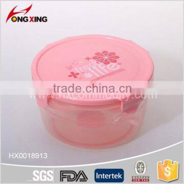 Household pink round four locked lunch box with spoon