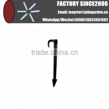 Land inserted poke Holddown support for micro jet