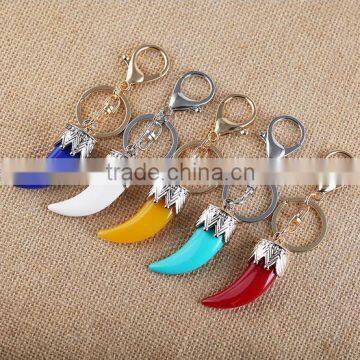 The new creative metal small pepper key chain resin bag pendant exquisite car accessories jewelry