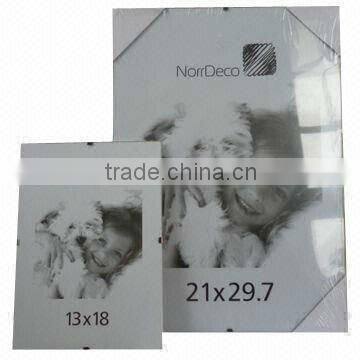 Frameless glass clip snap photo frame