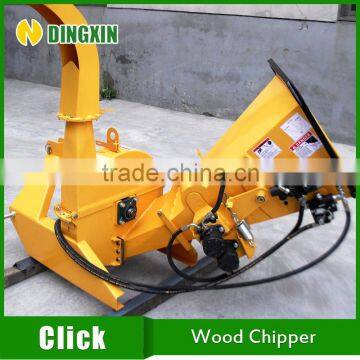 PTO wood chipper with self-feed system