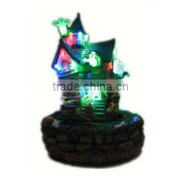 10" polyresin halloween house with rotating train, LED lighting & elves