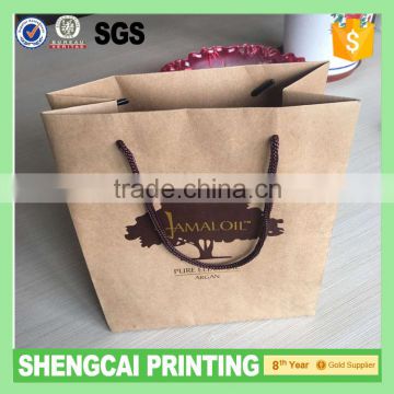 PP handle kraft paper bag.html for cosmetic packaging