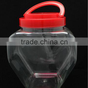 1000g cheap heart shaped clear plastic candy jar with hand lift lid
