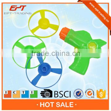 Cheap top quality kids plastic flying disc gun toy for sale