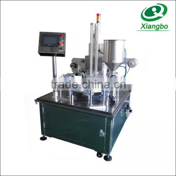 Low price turntable type cup filling sealing machine