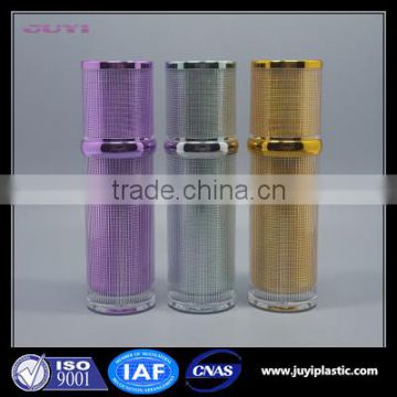 wholesale cylinder round shape purple /gold colored plastic cosmetic cream lotion bottle with cap and logo printing 30ml 50ml