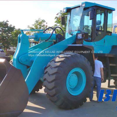 mini wheel loader with 360 degree wheatgrass fork and accessory