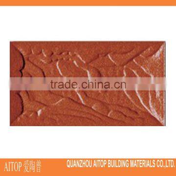 Red glazed terracotta ceramic wall brick tile exterior