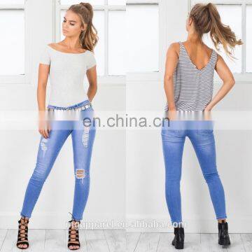 OEM wholesale mid wash women distressed skinny jeans with ripped details