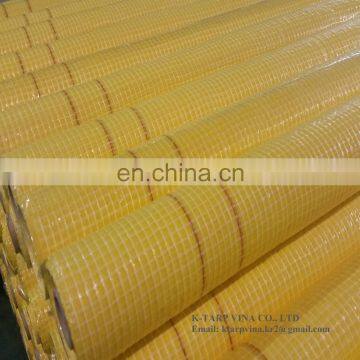 Leno PE tarpaulin, yellow color with micro perforations for waterproofing of low-slope roofing