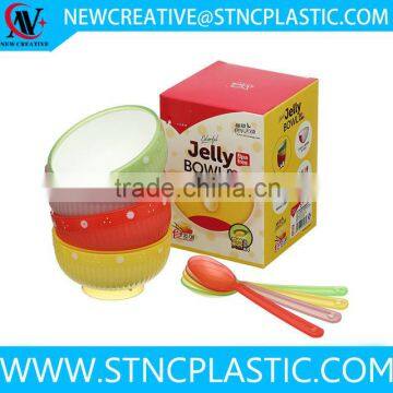 colorful reusable plastic salad bowl with spoon