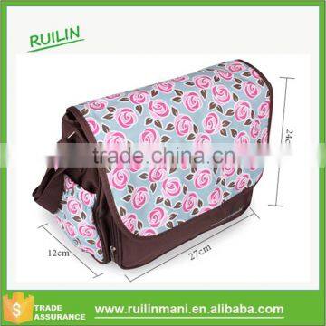 Shoulder belt diaper messenger bag with flower cover pattern