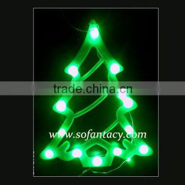 green colour led chirstmas tree decoration light on the window