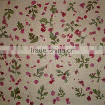 lokta paper with natural leaf and flower