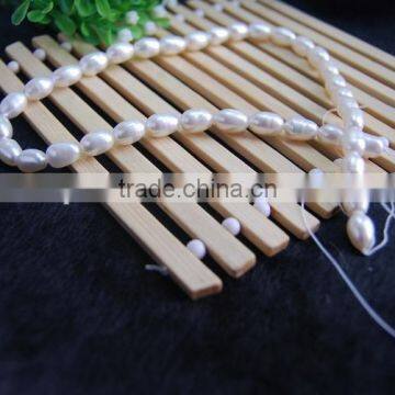 8-9mm White Rice Shape Freshwater Pearl Strand photo-5