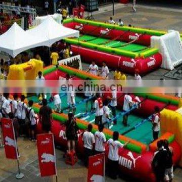 Inflatable human foosball table