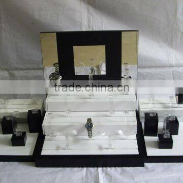 elegant countertop wooden watch display in black and white