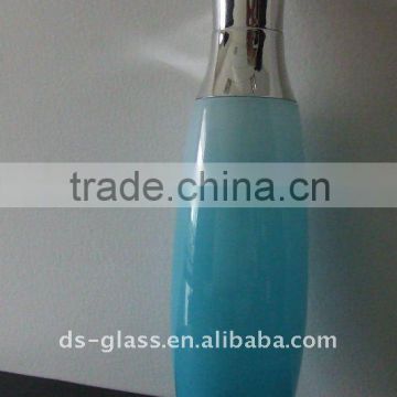 blue cream glass container pump sprayer with shining